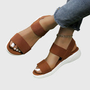 Auriane Whitfield | Black Double-Strap Orthopedic Flat Sandals