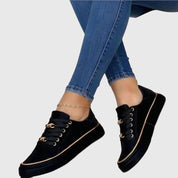 Serena Winthrop | Black Platform Sneakers with Gold Chain Detail