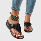 Serena Valmorcourt | Black Wedge Toe Loop Sandal with Laser Cut Detail