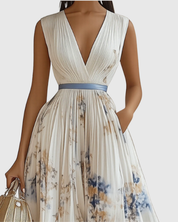 Lucienne Hartwell | Floral Pleated Midi Dress with V-Neck