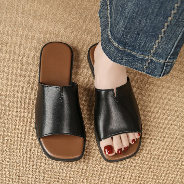 Margolaine Dubreuil | Black Faux Leather Flat Slide Sandals