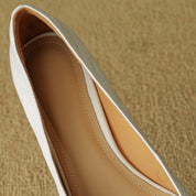 Violette Sanscourt | Burgundy Leather Pointed-Toe Heels with Gold Rose Detail