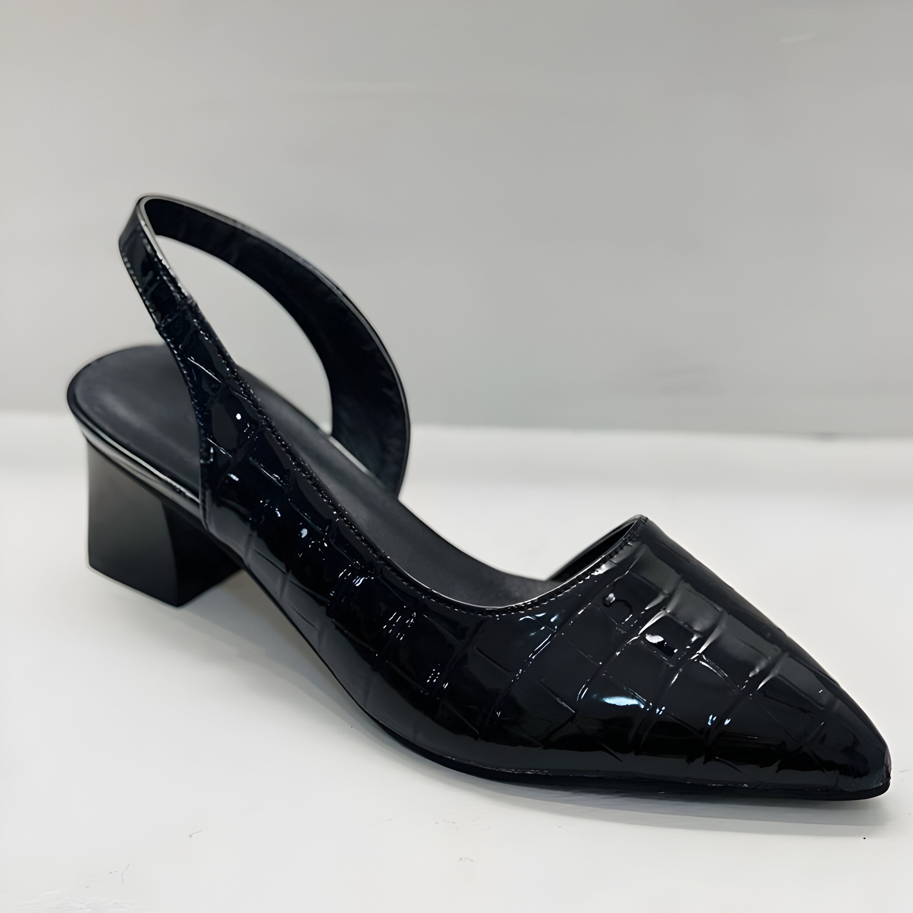 Celestine Duvarre | Black Patent Pointed-Toe Slingback Heels