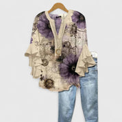 Celestine Ravenmore | Blue Floral Ruffle Sleeve Blouse