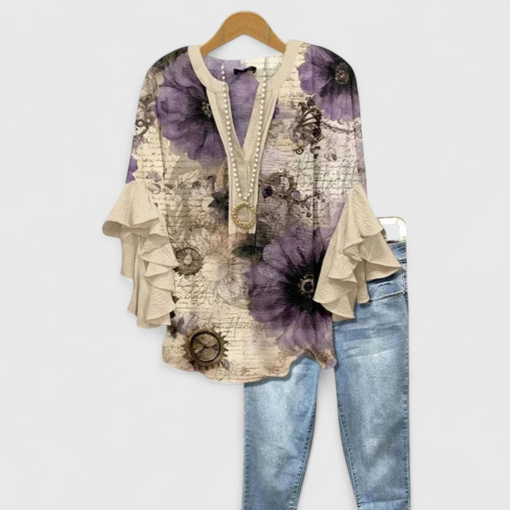 Celestine Ravenmore | Blue Floral Ruffle Sleeve Blouse