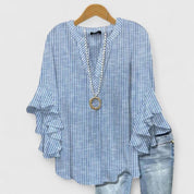 Celestine Ravenmore | Blue Floral Ruffle Sleeve Blouse