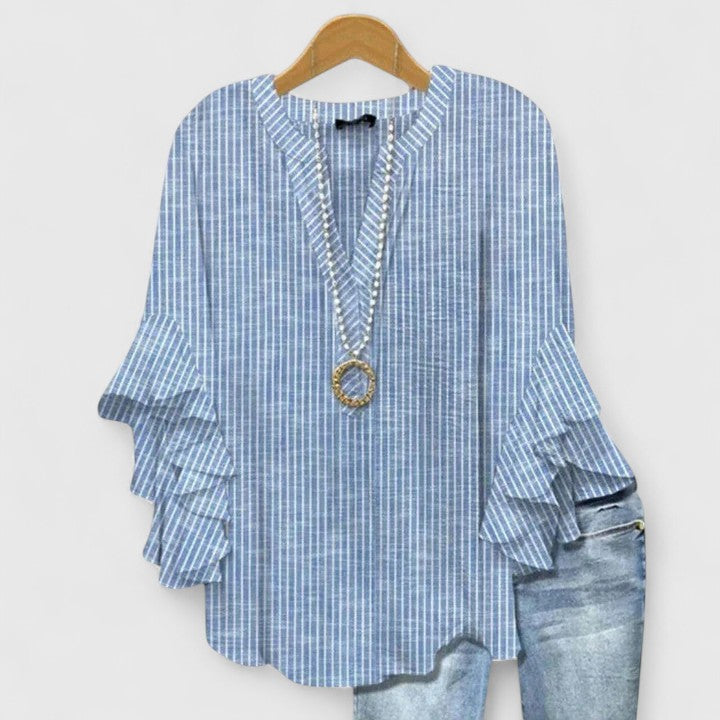 Celestine Ravenmore | Blue Floral Ruffle Sleeve Blouse