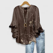 Celestine Ravenmore | Blue Floral Ruffle Sleeve Blouse