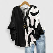 Celestine Ravenmore | Blue Floral Ruffle Sleeve Blouse