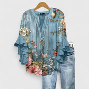 Celestine Ravenmore | Blue Floral Ruffle Sleeve Blouse