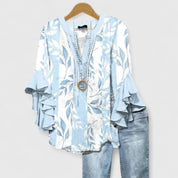 Celestine Ravenmore | Blue Floral Ruffle Sleeve Blouse