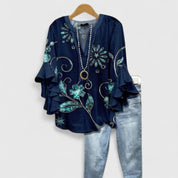 Celestine Ravenmore | Blue Floral Ruffle Sleeve Blouse