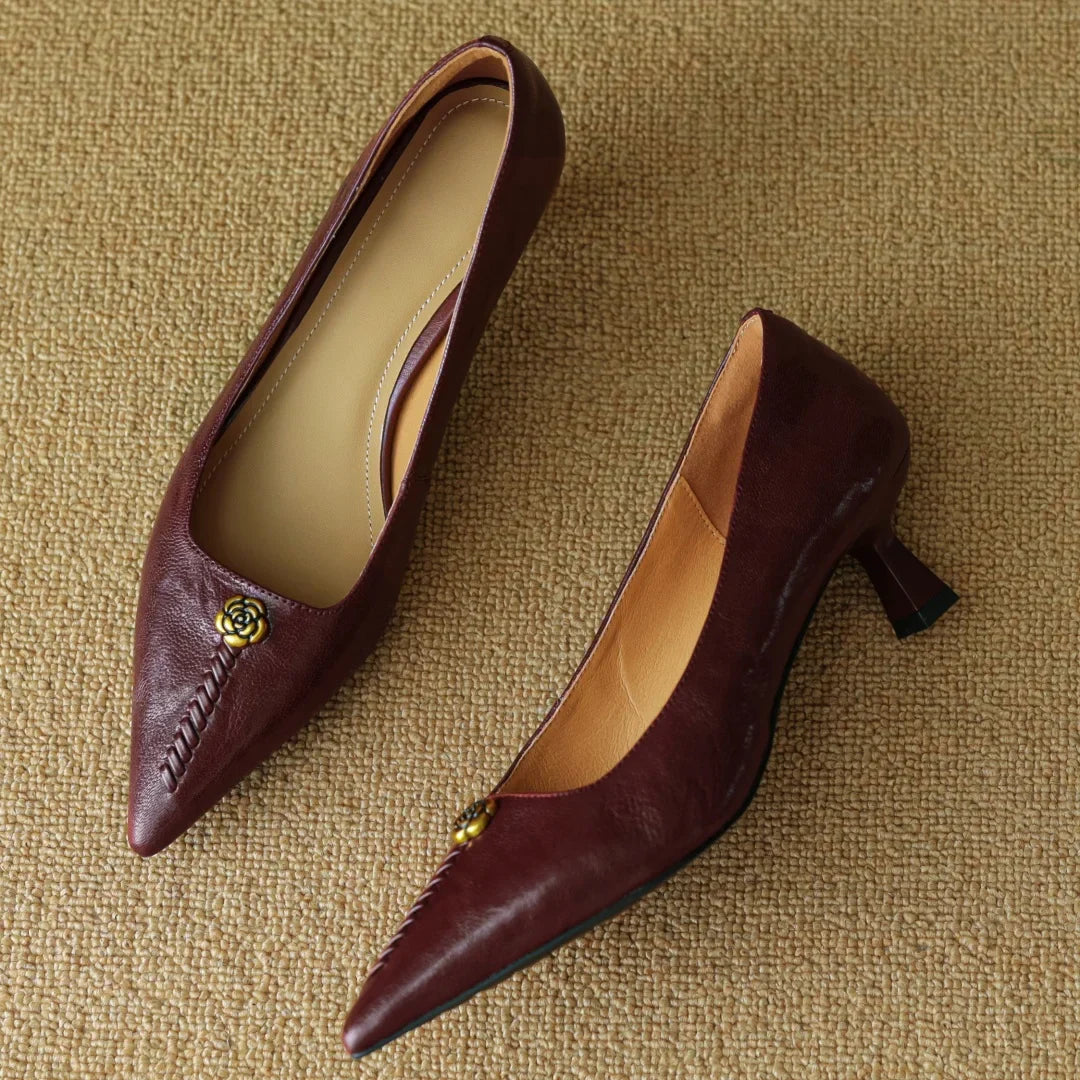 Violette Sanscourt | Burgundy Leather Pointed-Toe Heels with Gold Rose Detail