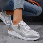 Elara Vanthorpe | Silver Metallic Platform Sneakers with Side Zipper