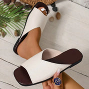 Séraphine Dawnbury | Black Flat Open-Toe Slide Sandals