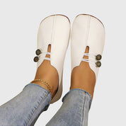 Aurelia Strandcourt | Vintage Brown Suede Slip-On Flats with Button Detail