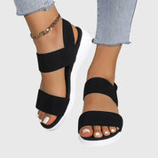 Auriane Whitfield | Black Double-Strap Orthopedic Flat Sandals