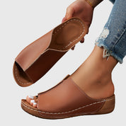 Lucienne Ashvale | White Open-Toe Wedge Slides
