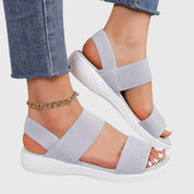 Auriane Whitfield | Black Double-Strap Orthopedic Flat Sandals