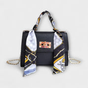 Juliette Moreau | Black Structured Handbag with Scarf Handle & Gold Chain