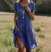 Roseline Montvert | Boho Floral Print Short Sleeve Midi Dress