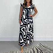 Theodine Valbright | Abstract Print Wide-Leg Jumpsuit with Ruffle Cap Sleeves